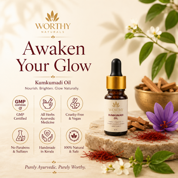 Worthy Naturals Kumkumadi Oil in a glass dropper bottle with a gold collar, displayed on a stone slab with Ayurvedic ingredients like cinnamon, red sandalwood, and a purple flower against a warm cream background.
